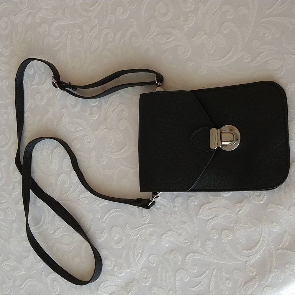Nwot. (3 for $15) Black crossbody phone purse.